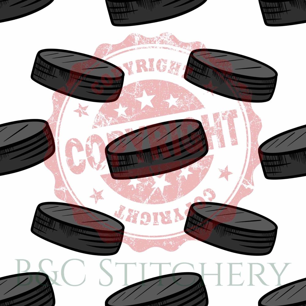 Pattern of hockey pucks on white background