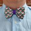 Christmas bow tie on blue shirt