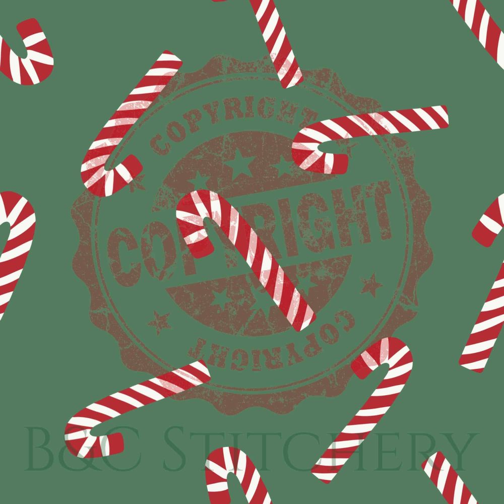 Candy canes on green with copyright mark