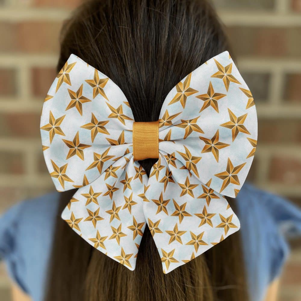 Woman with star-patterned bow in hair