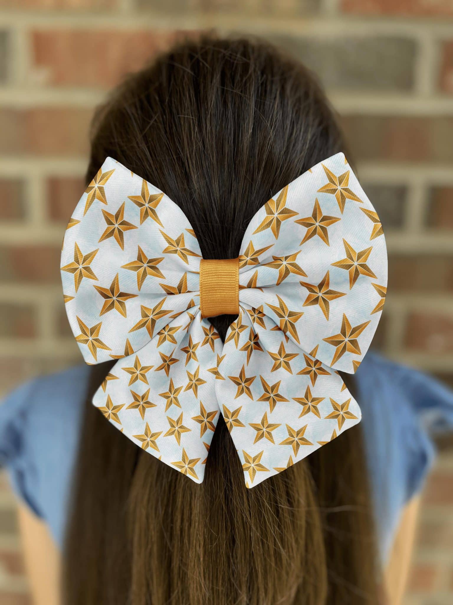 Woman with star-patterned bow in hair