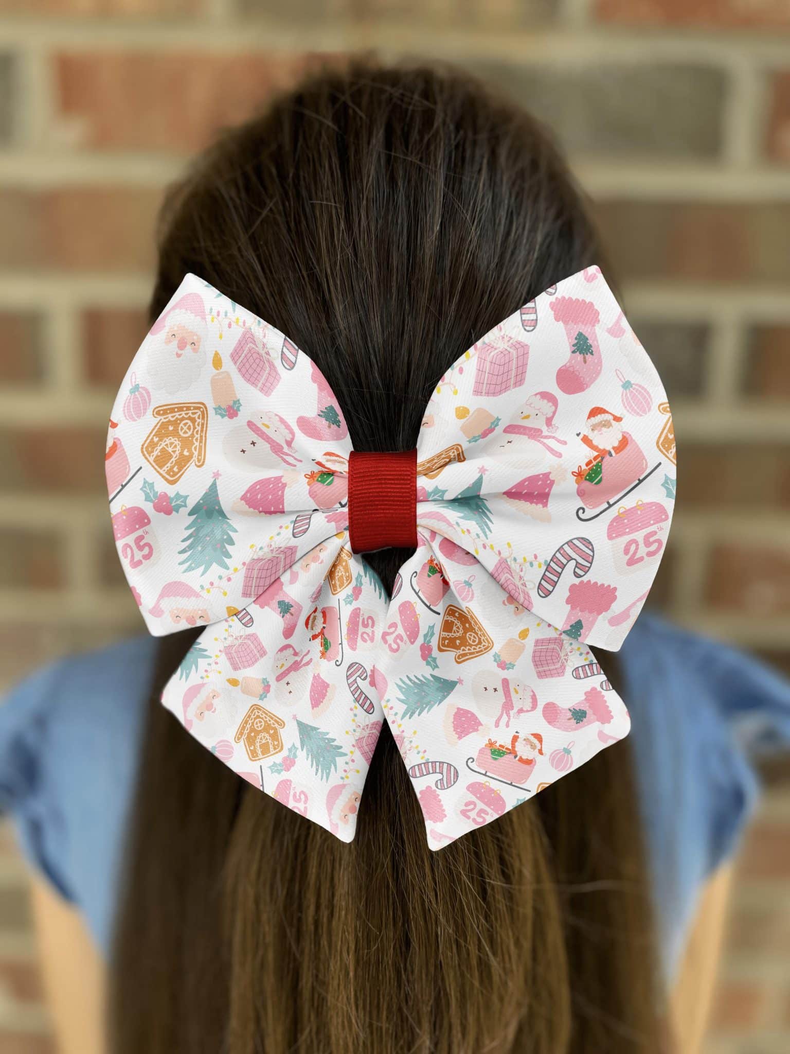 Girl with festive Christmas bow in hair