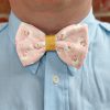 Man's shirt with pink Santa bow tie