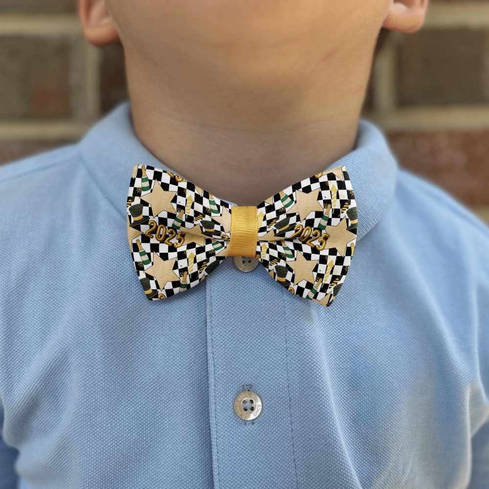 Child wearing a 2025 checkered bow tie